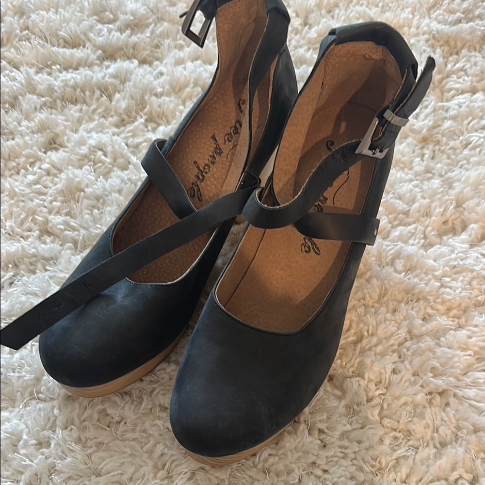 Brand new never worn Free People Black Mules with Structured Design
